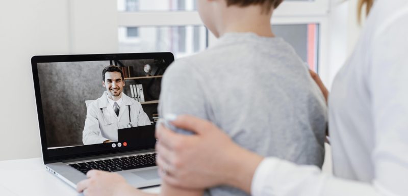close-up-patient-talking-doctor-online-scaled.jpg